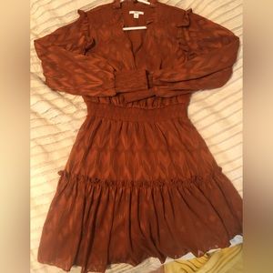 SUPER cute burnt orange dress.